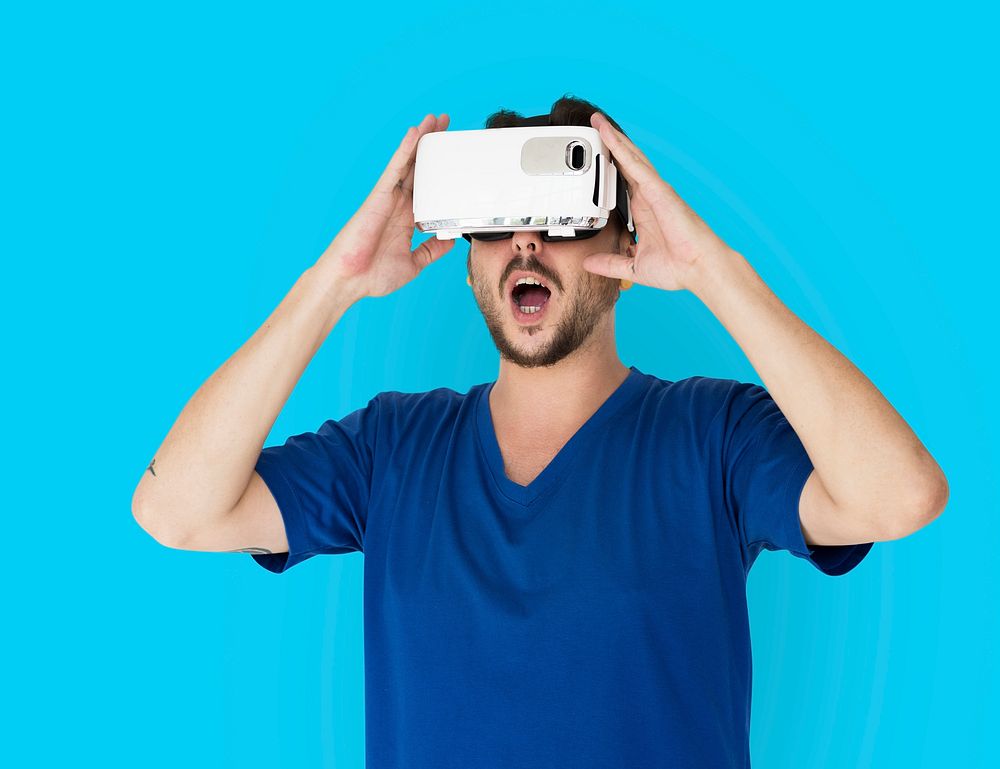 A man using a visualiaing reality gadget