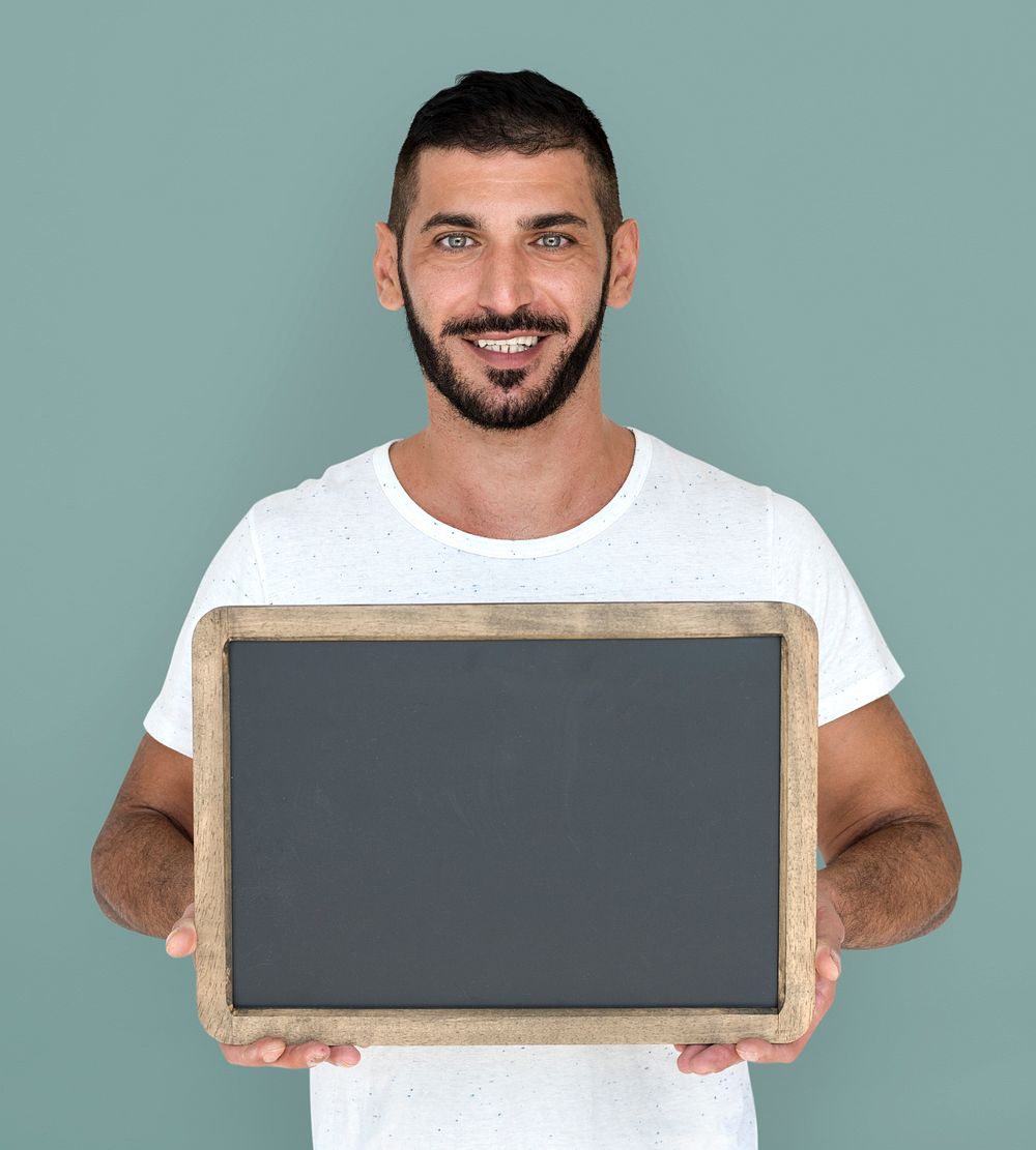 Man Holding Chalkboard Smiling Happy