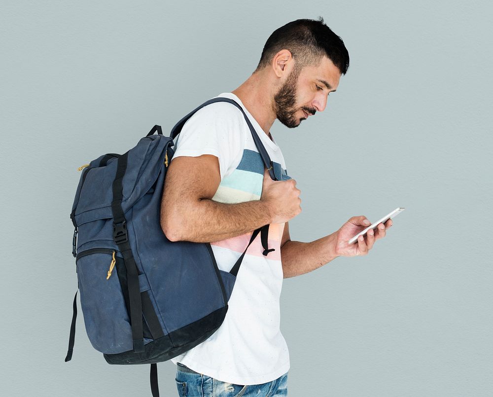 Middle Eastern Man Carrying Backpack Mobile Phone Studio Portrait