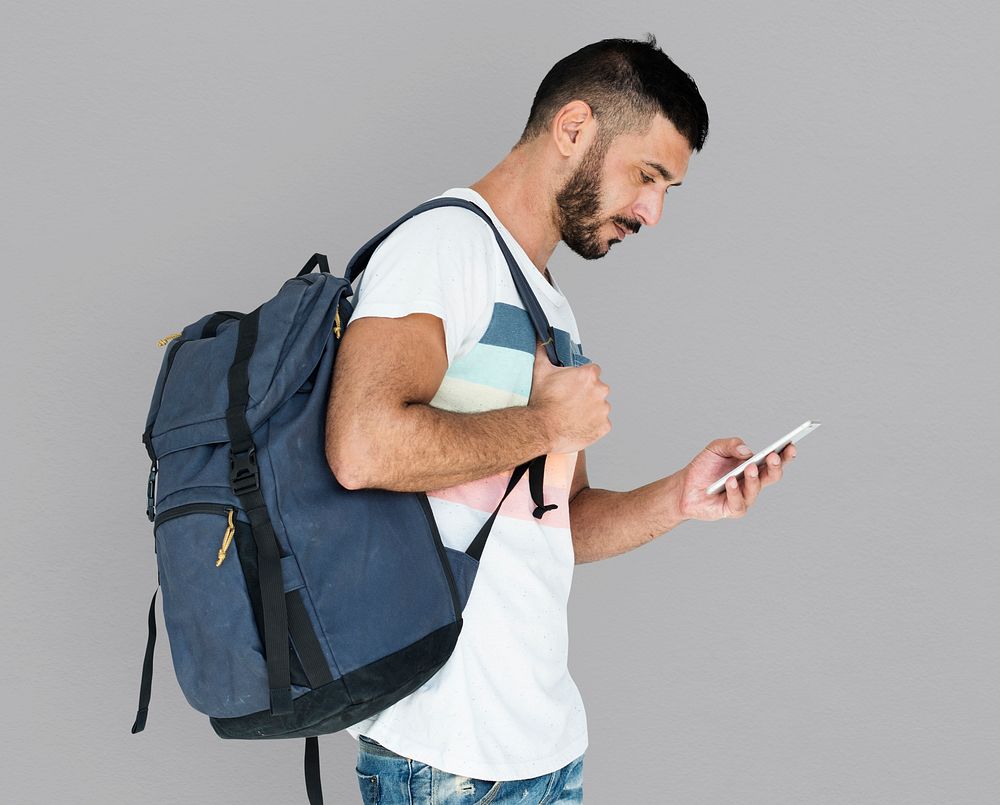 Middle Eastern Man Carrying Backpack Mobile Phone Studio Portrait