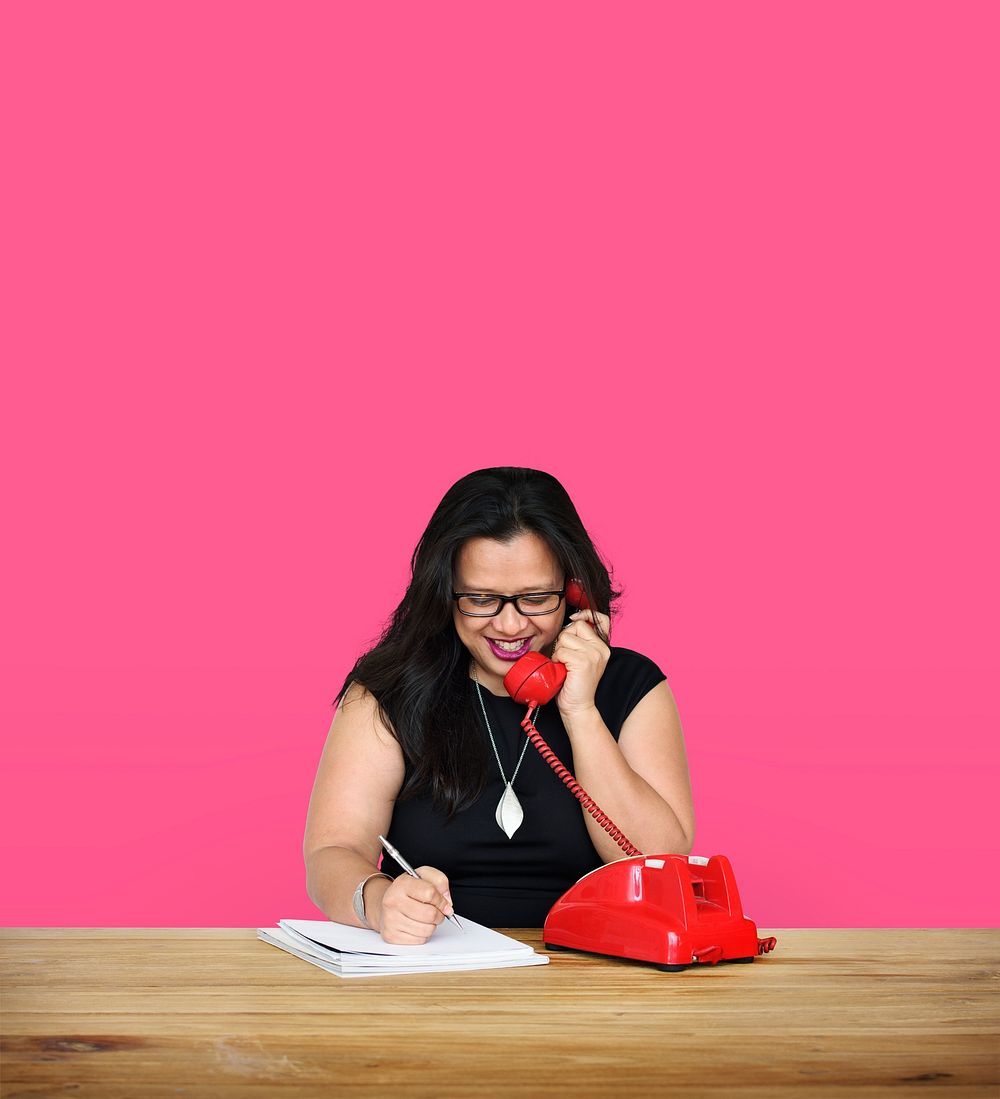 Woman Writing Talking Telephone Communication