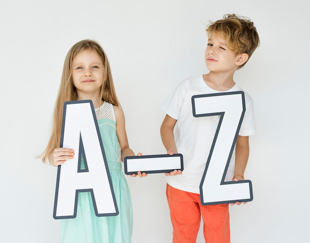 Kids holding letters of the alphabet