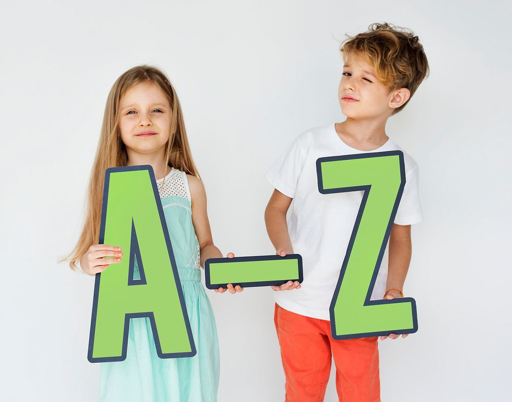 Kids holding letters of the alphabet