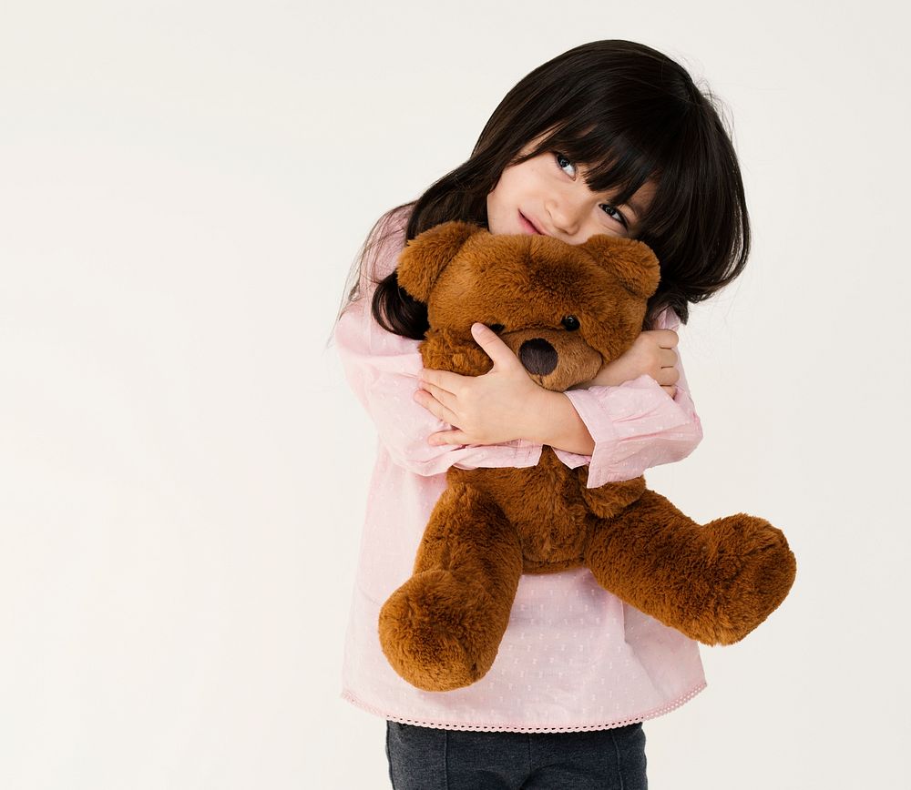 Cute girl with a teddy bear