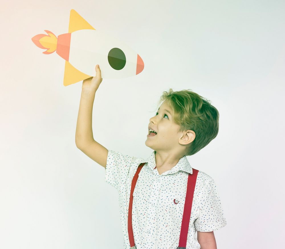 Boy Holding Spaceship Rocket Icon