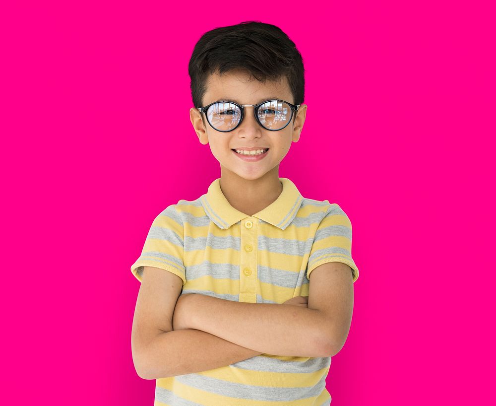 Boy with glasses with arms crossed portrait