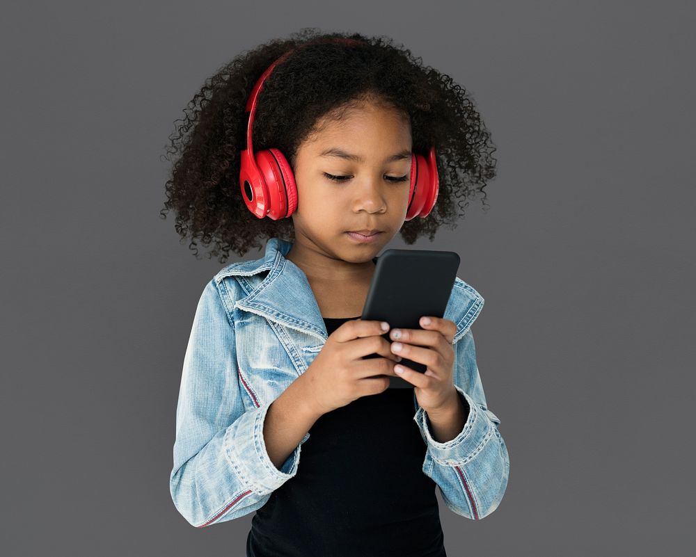 Little Girl Holding Phone Headphones