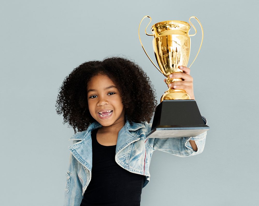 Little Girl Holding Trophy Happy