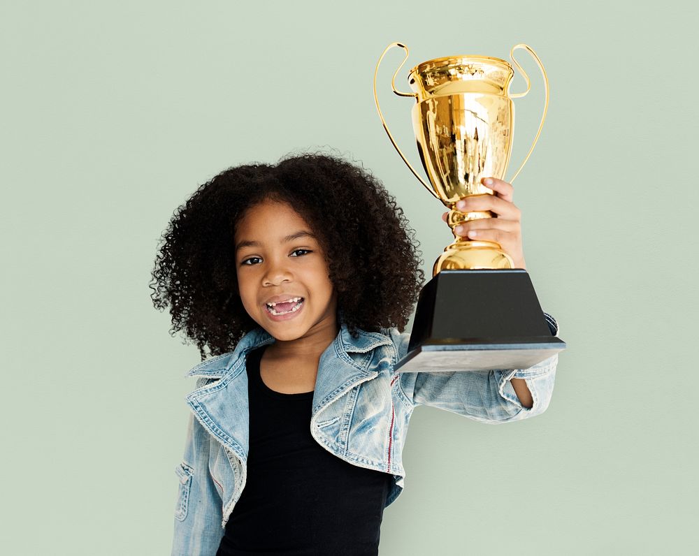Little Girl Holding Trophy Happy