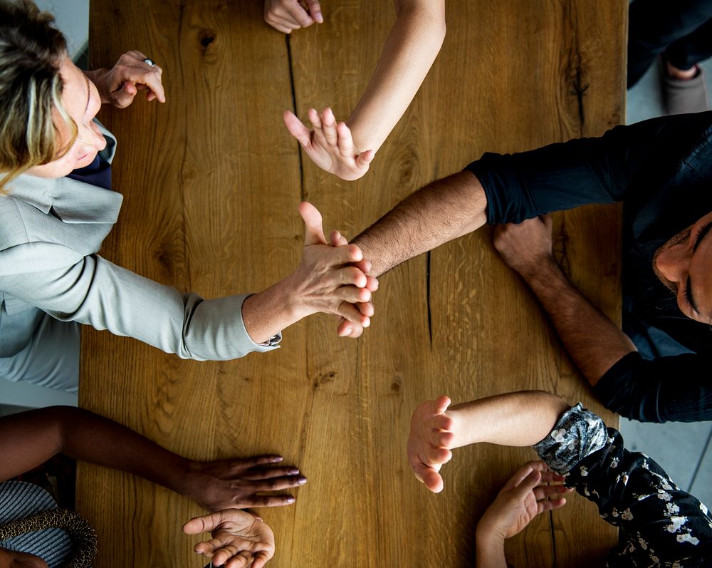 People Hands Together Partnership Teamwork