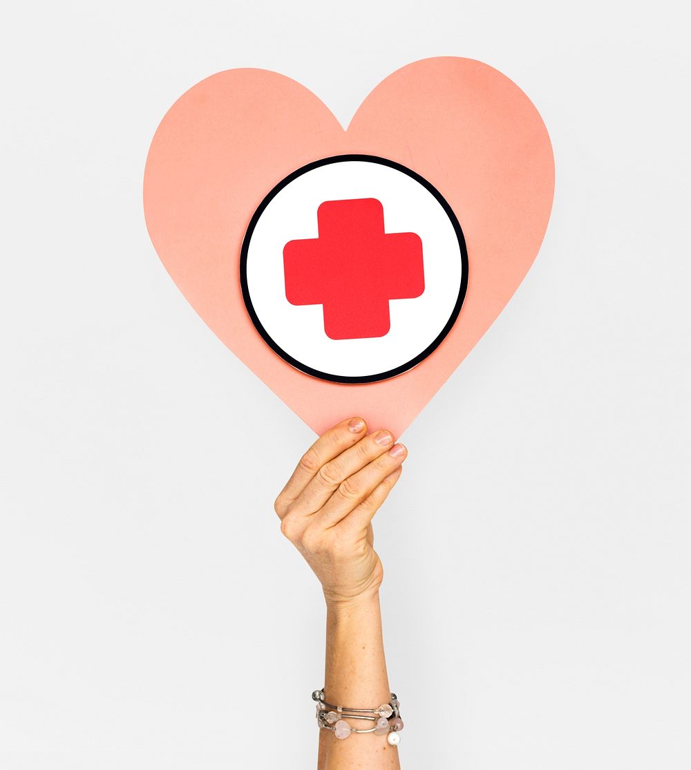 Human Hand Holding Heart Red Cross
