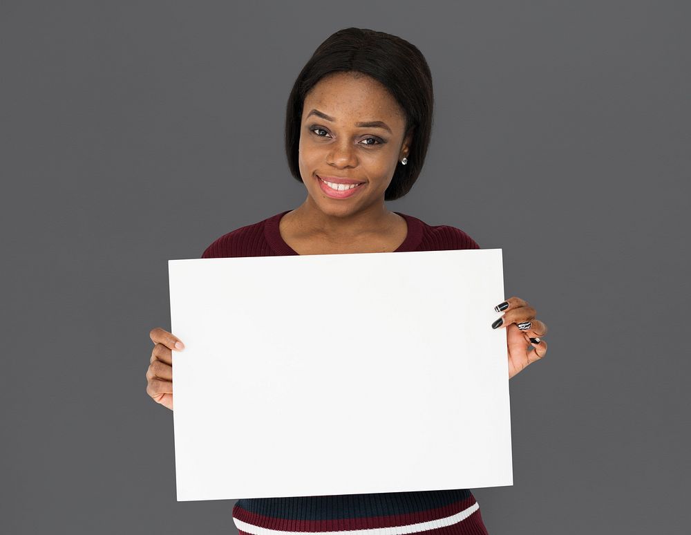 African Descent Woman Smiling Holding Paper