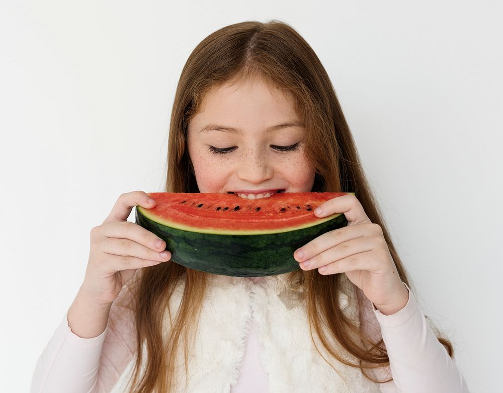 Schoolboy Smiling Eating Watermelon Shoot on White Background