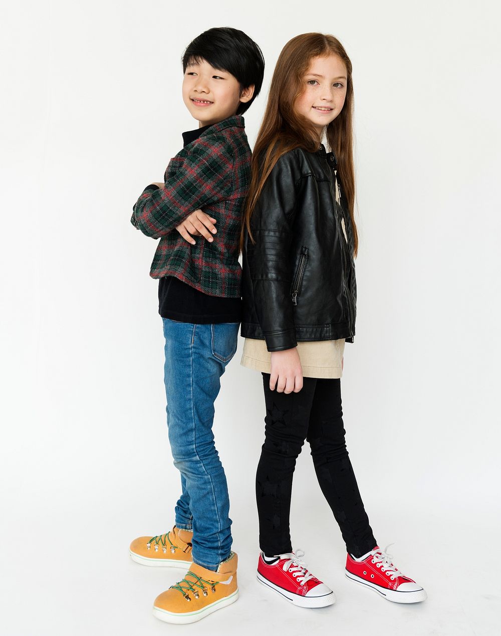 Boy and girl is in a studio shoot.
