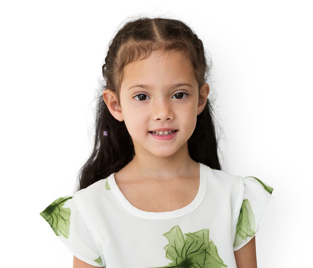 Young little girl with awkward smile expression portrait