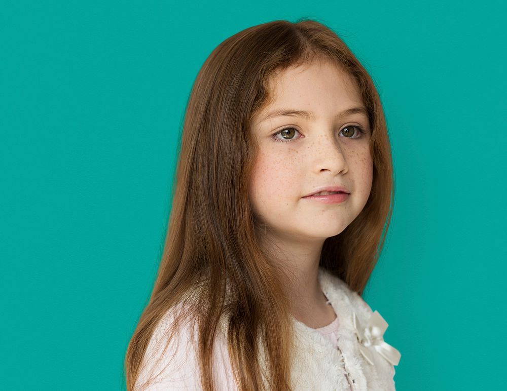 Young girl with a blank expression isolated portrait