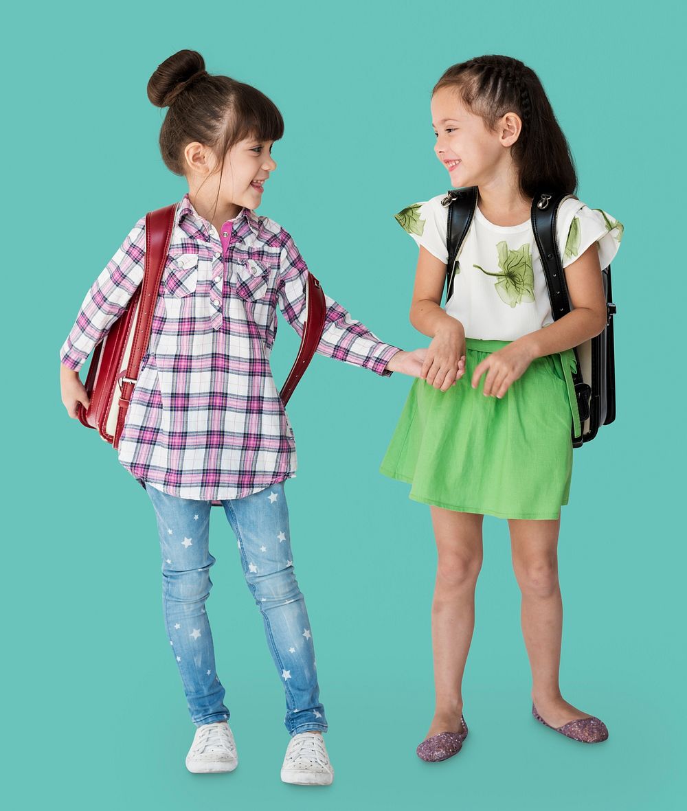 Two girls with a backpack