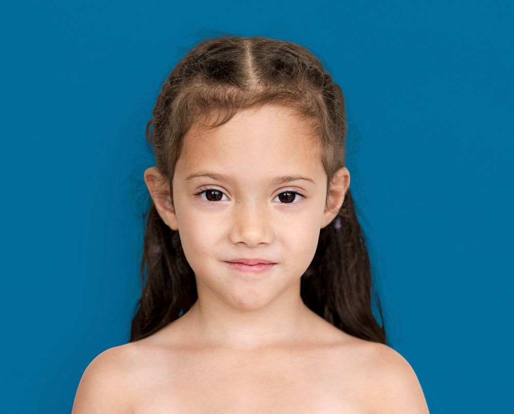 Young asian girl with awkward smile shoulder and head portait