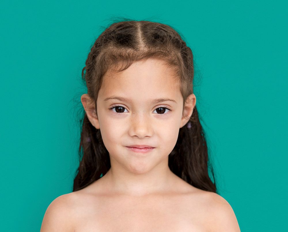 Young asian girl with awkward smile shoulder and head portait