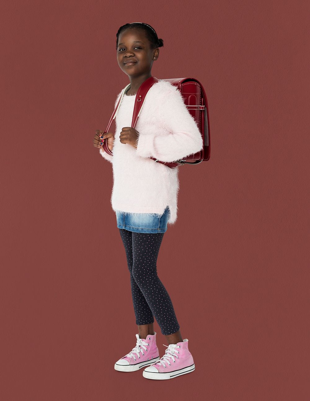 Young black kid student with a backpack full body portrait