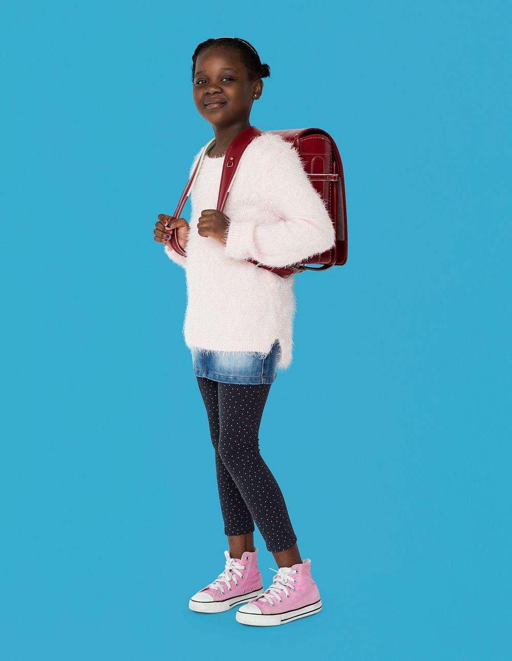 Young black kid student with a backpack full body portrait
