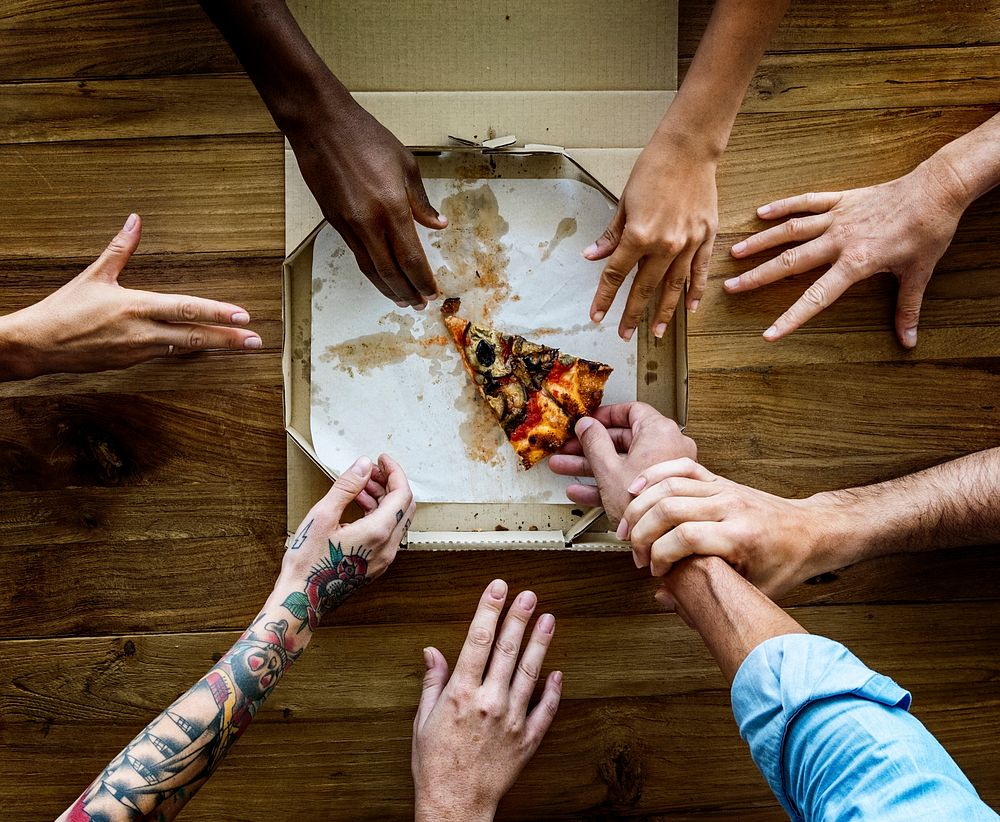 People Hands Grabbing Pizza from Delivery Box
