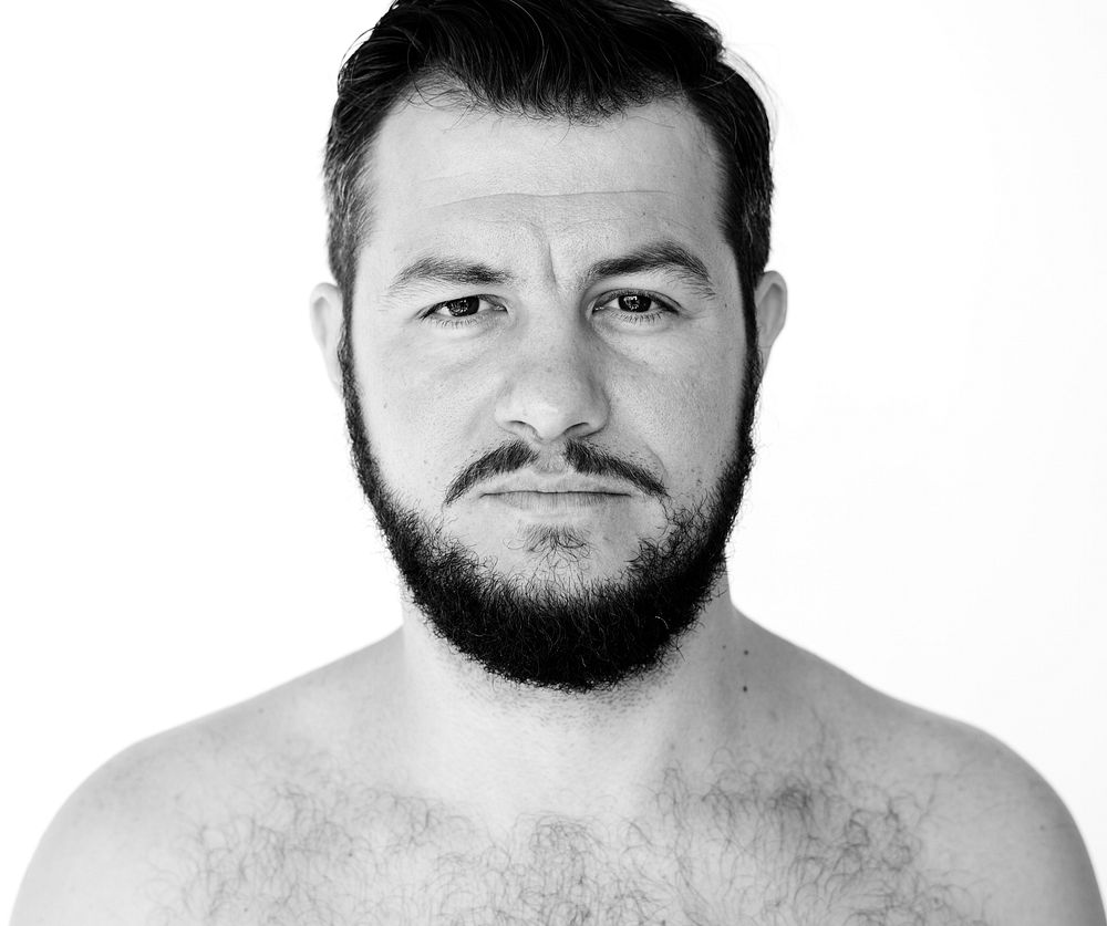Man mustache bare chest studio portrait