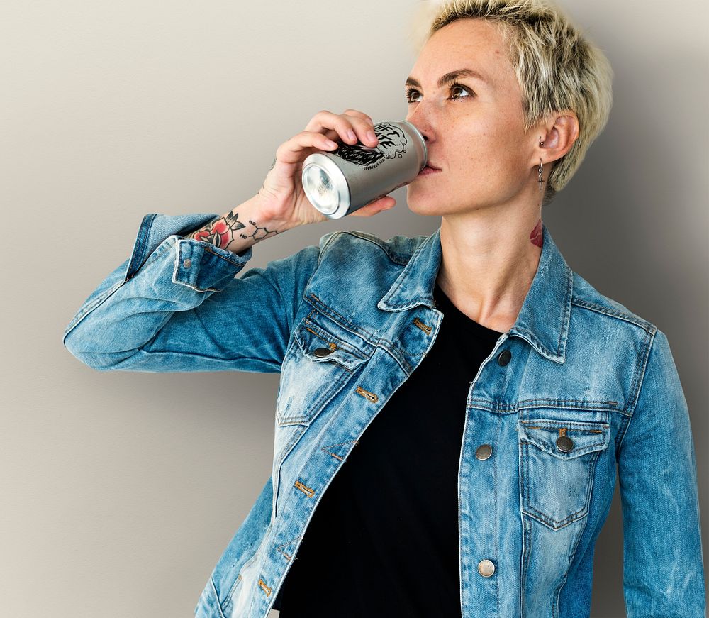 Adult Woman Drinking Beverage from Can