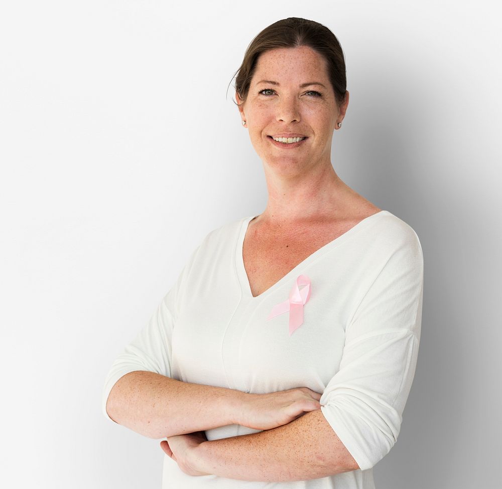Adult Woman with Pink Ribbon on Shirt Cancer Awareness Campaign