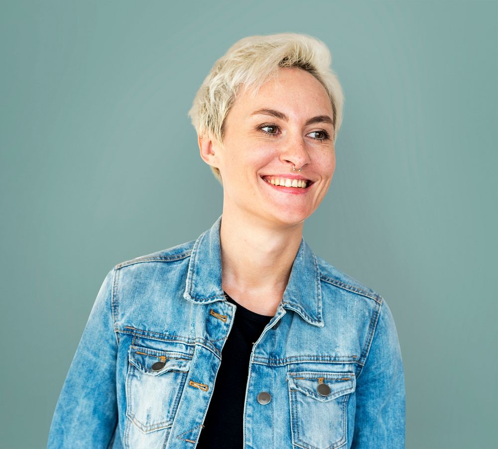 Portrait of a cheerful woman in a denim jacket