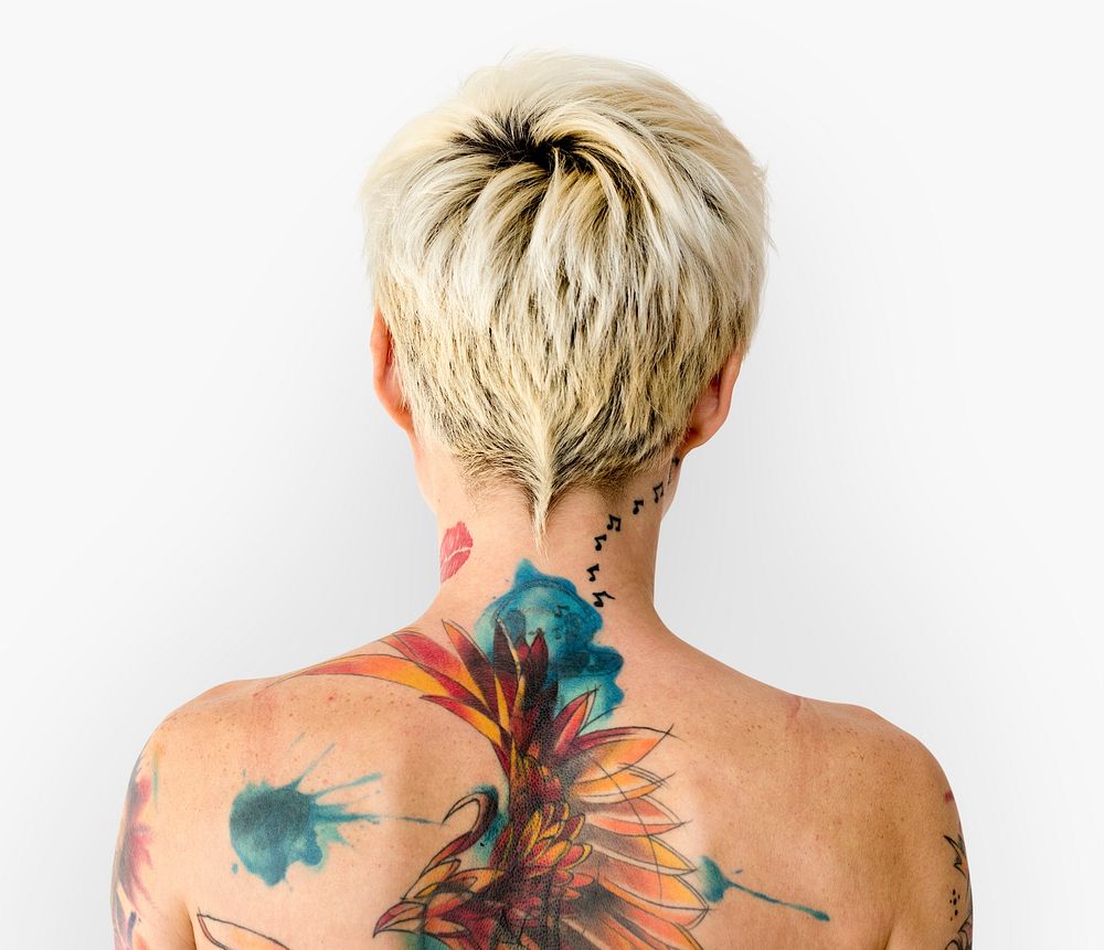 Blonde woman with a colorful back tattoo