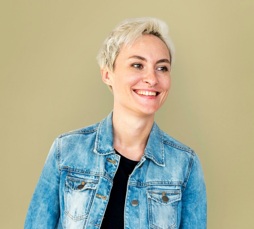Portrait of a cheerful woman in a denim jacket
