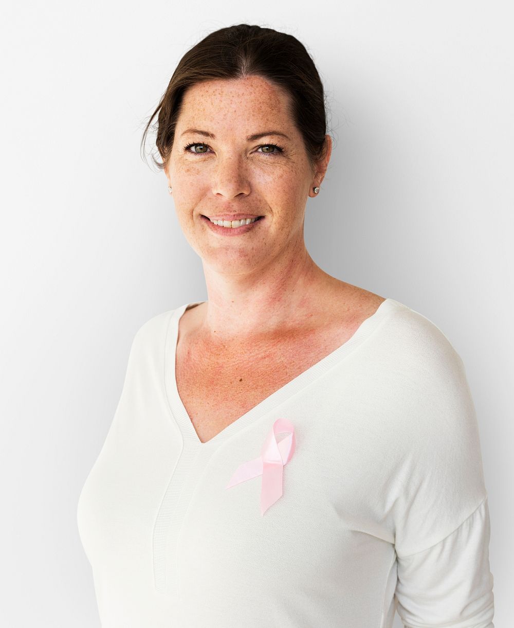 Caucasian Woman with a Pink Breast Cancer Ribbin