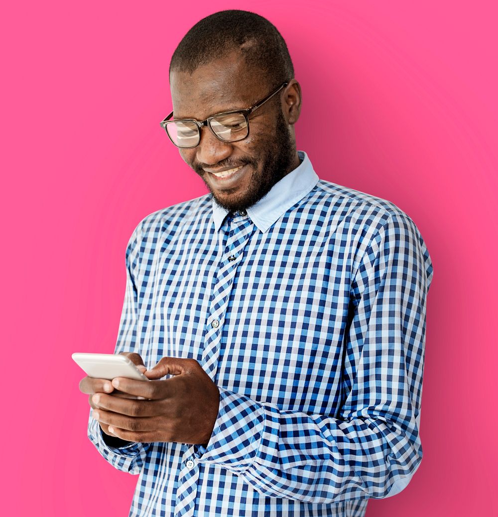 African Descent Guy is Smiling with Smartphone
