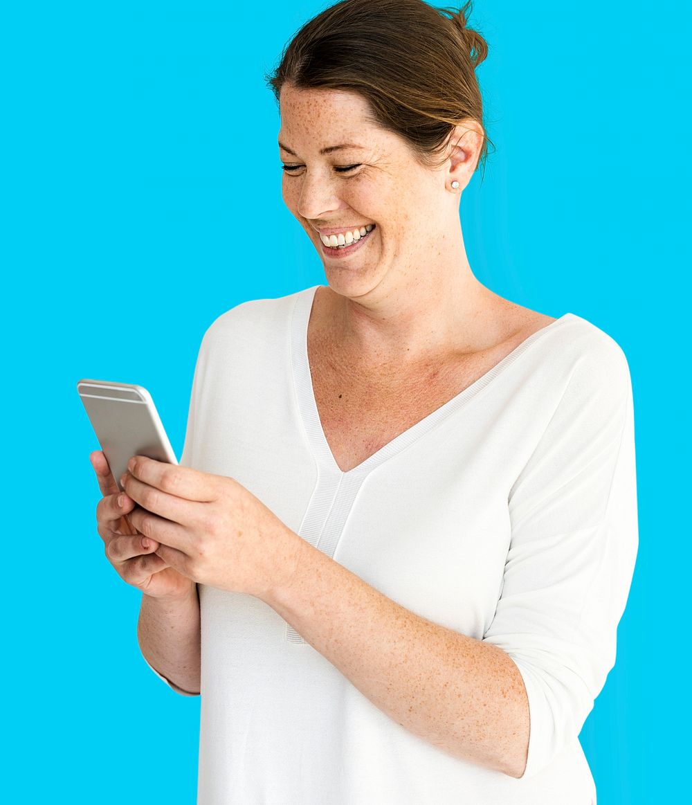 Caucasian Woman is Smiling with Smartphone