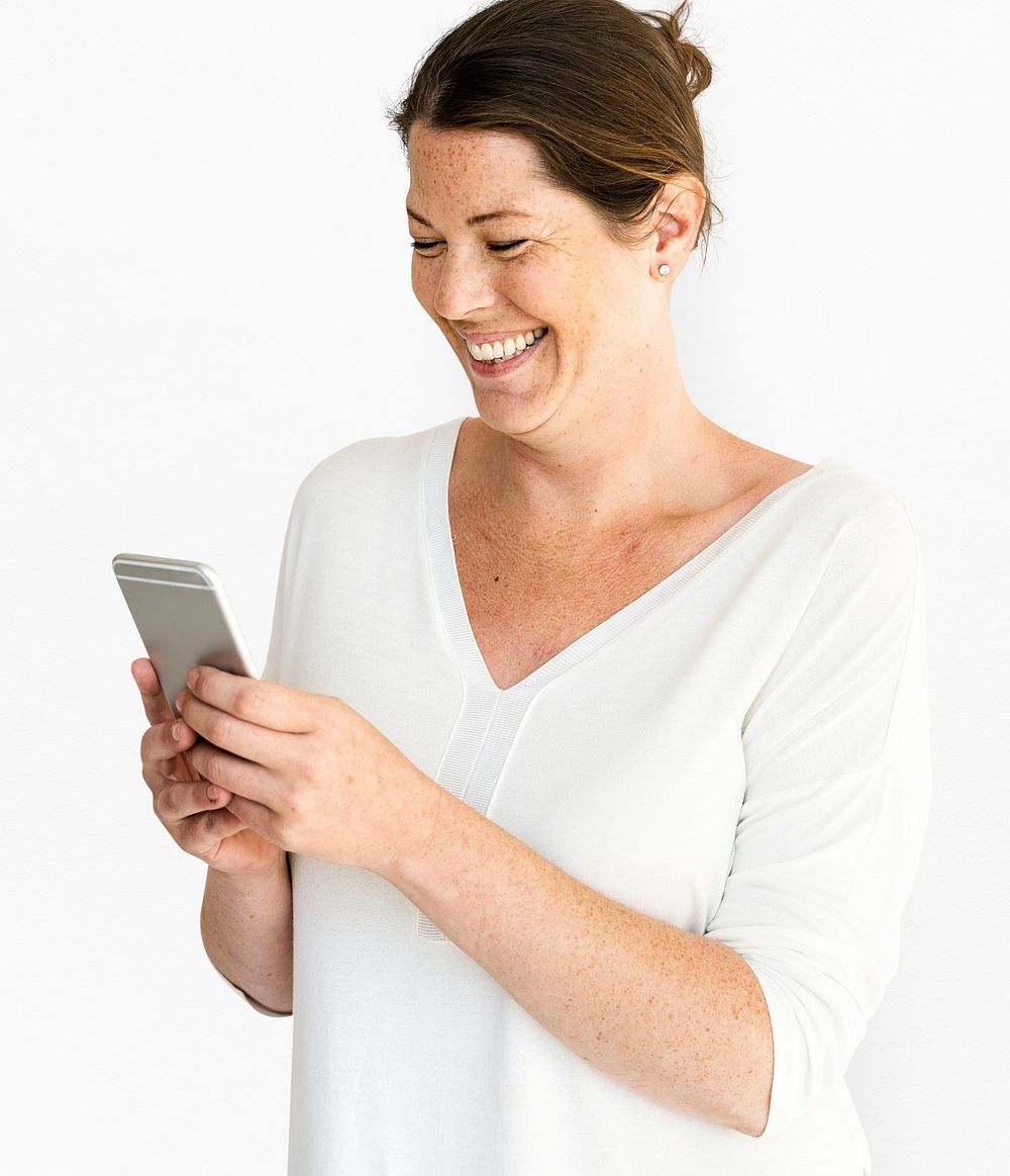 Caucasian Woman is Smiling with Smartphone