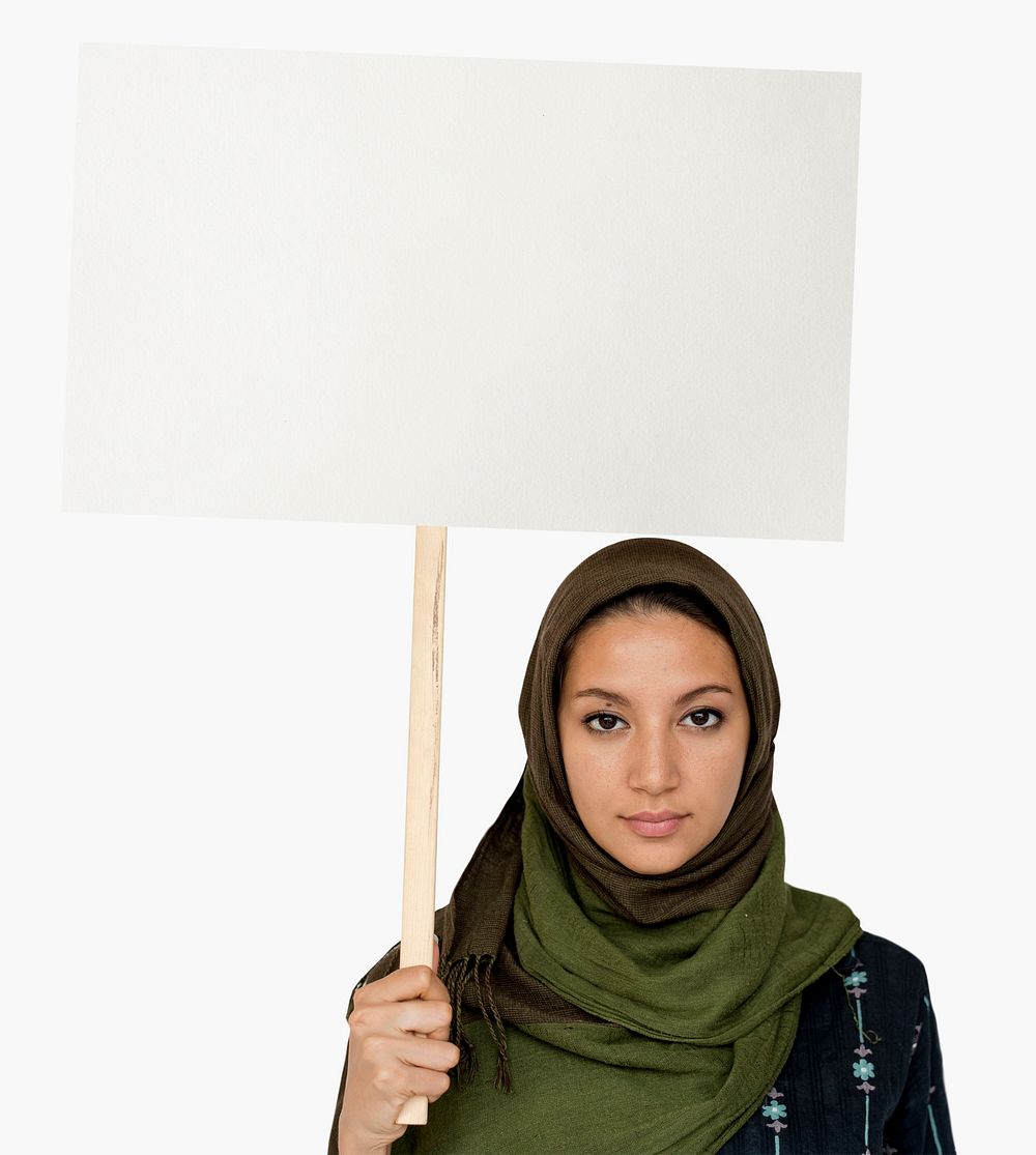 Muslim woman showing a blank protest board