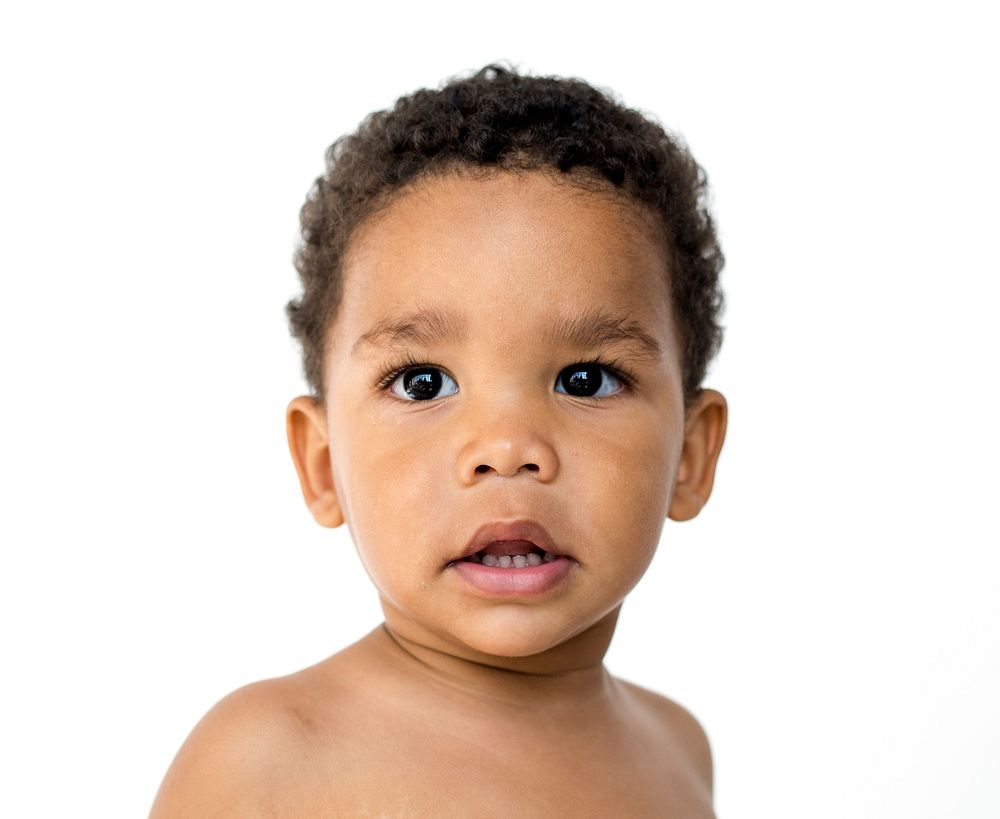 Lonely little boy bare chest studio portrait