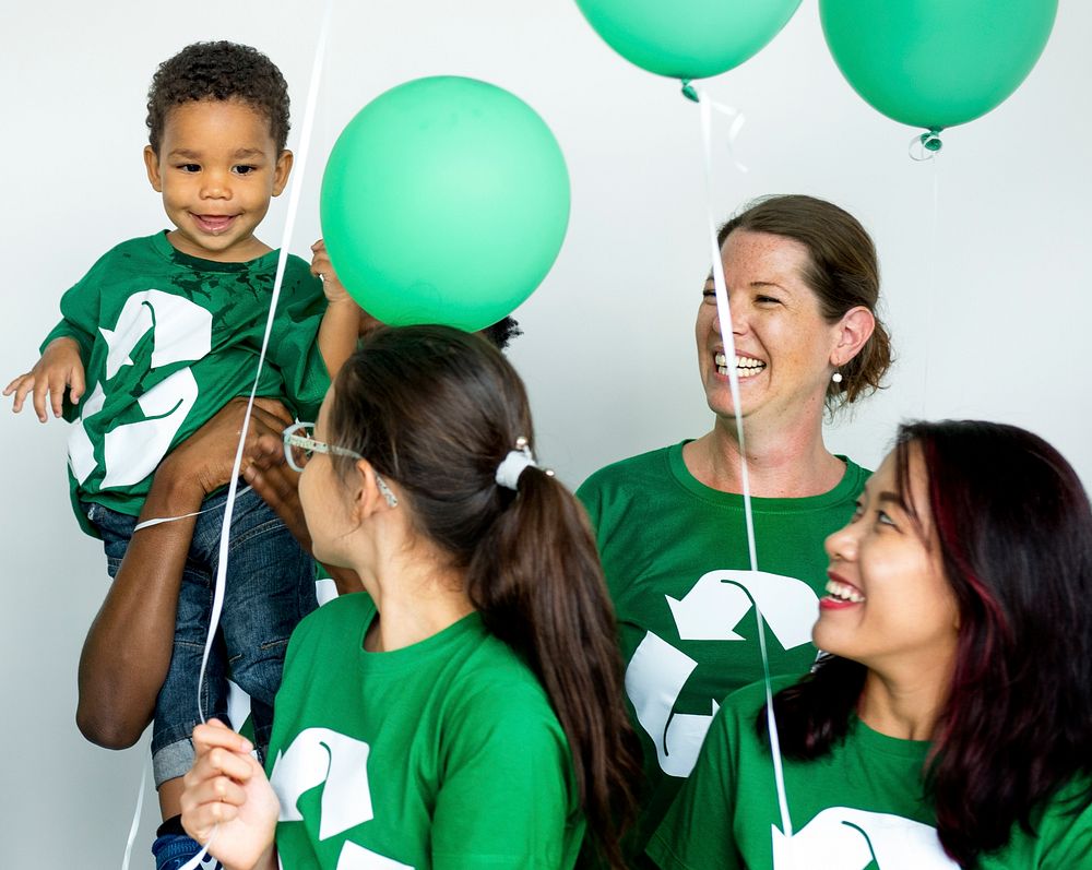 People with Recycle Symbol and Green Balloons