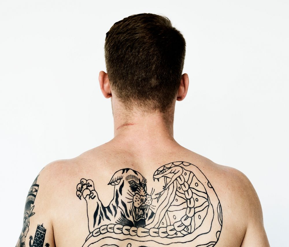 A man full of tattoos