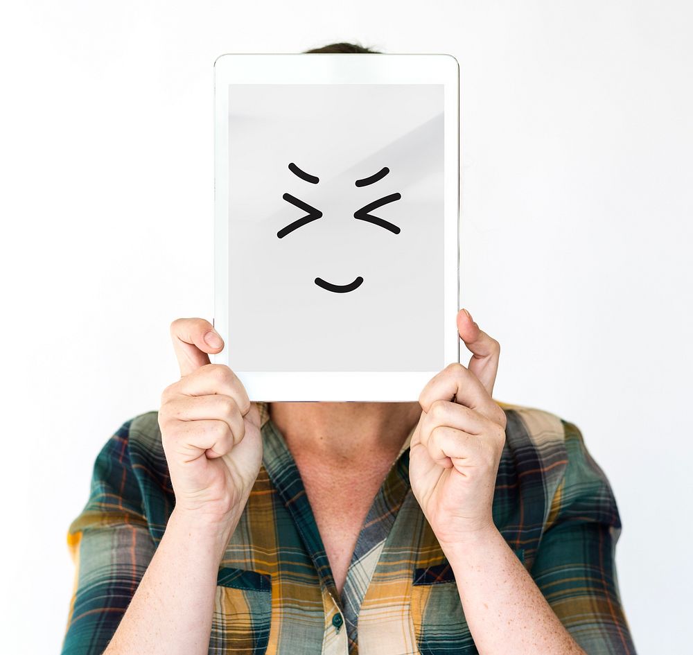 Woman Face Covered with Digital Tablet