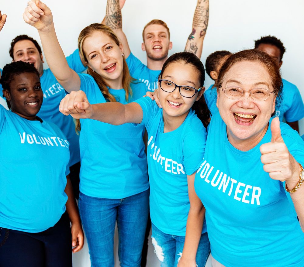 Happy volunteers united together