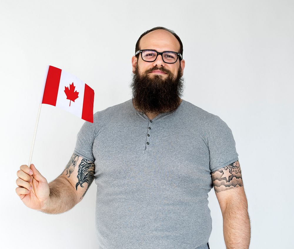 Adult Man Hand Hold Canada Nation Flag Studio Portrait