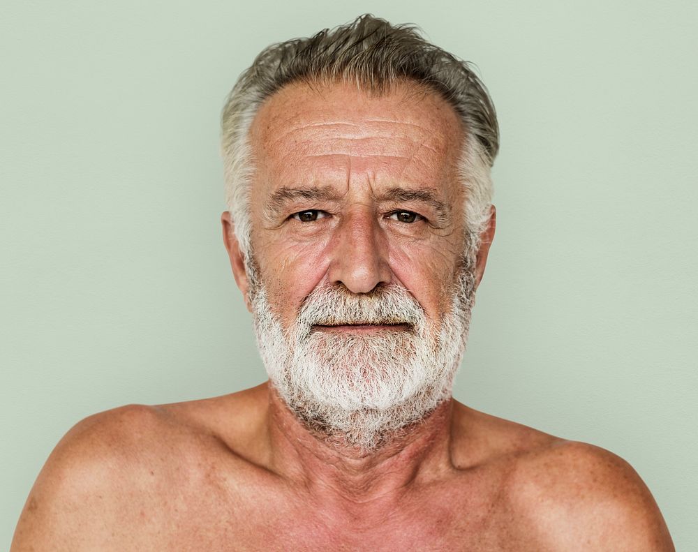 Senior adult man mustache bare chest studio portrait