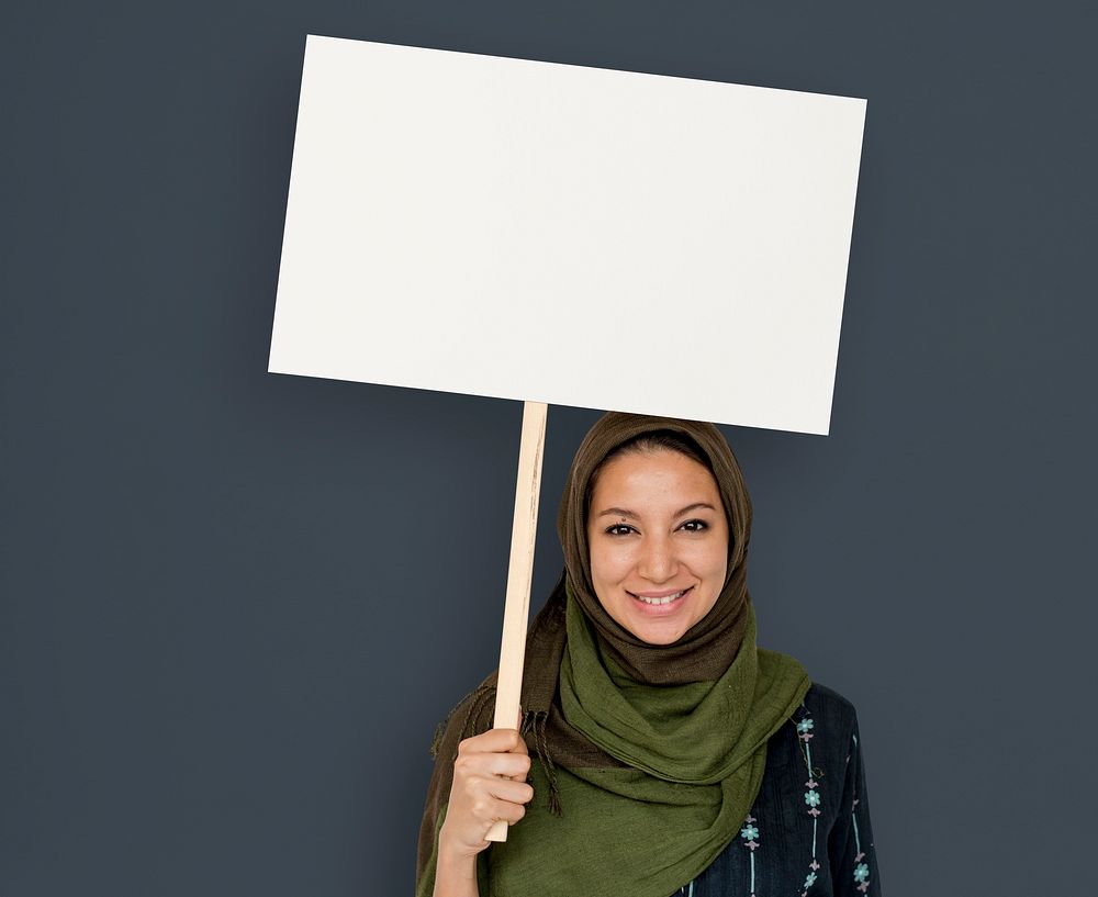Arabian Woman Face Covered with Hijab Holding Board Sign Studio Portrait