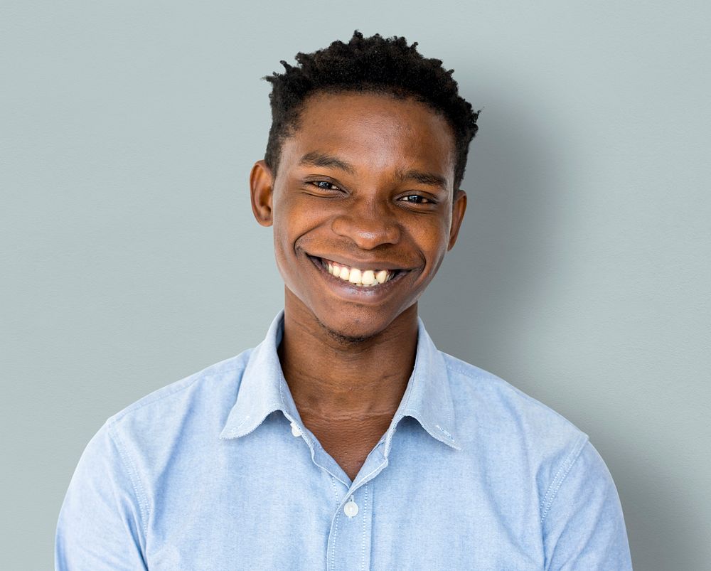 Happiness african man smiling studio portrait
