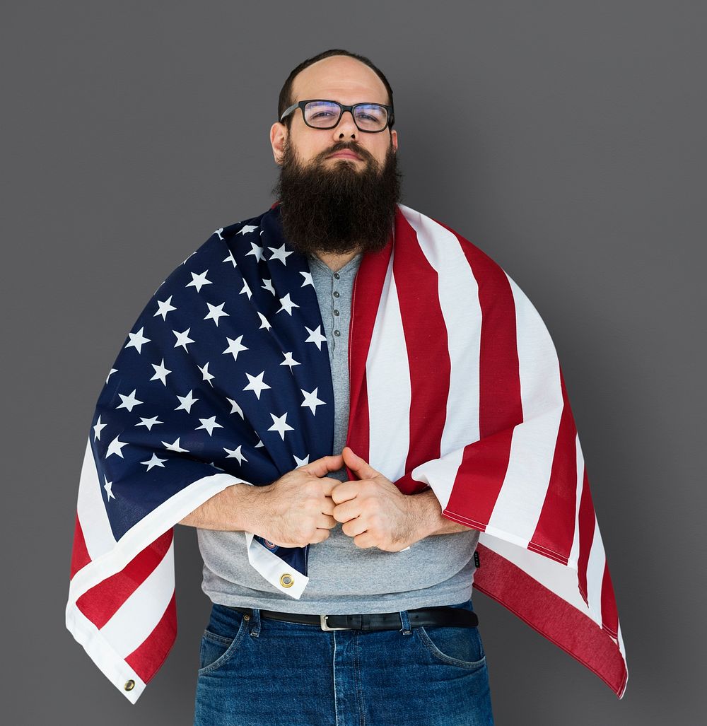 Man holding flag and posing for photoshoot