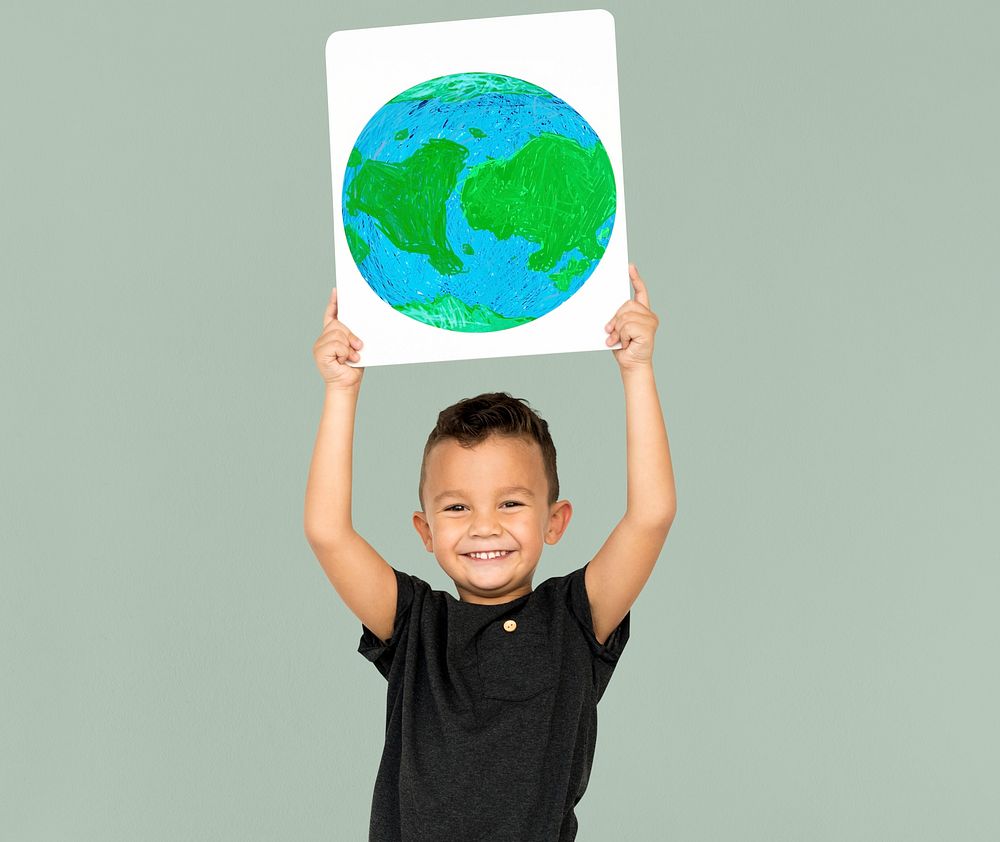 Little Boy Holding Global Paper Board Studio Portrait