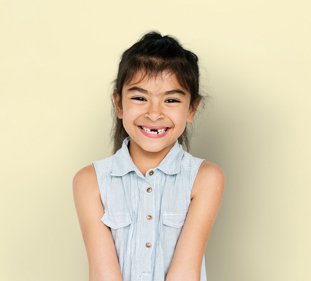 Little Girl with Smiling Face Expression Studio Portrait
