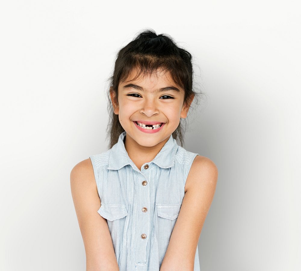 Little Girl with Smiling Face Expression Studio Portrait